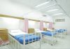 What to Do When Medical Bills Start Piling Up After an Accident empty hospital bed inside room