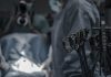 What to Expect Before, During, and After Hernia Surgery gray surgical scissors near doctors in operating room