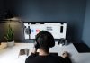 How Decentralized Currency Is Transforming Jobs, Freelance Markets, and Global Employment man in black shirt sitting in front of computer