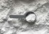 How whey protein can make a huge difference to those looking to get in perfect condition black magnifying glass on white and brown marble table