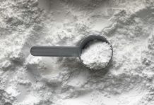 How whey protein can make a huge difference to those looking to get in perfect condition black magnifying glass on white and brown marble table