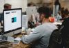 Why Developers Should Care About File Format Compatibility in User Uploads man in gray sweatshirt sitting on chair in front of iMac