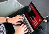 Access Polish Websites Like a Native: Your Guide to Poland Proxies Person working remotely on a laptop while sitting comfortably on a beanbag chair indoors.