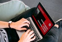 Access Polish Websites Like a Native: Your Guide to Poland Proxies Person working remotely on a laptop while sitting comfortably on a beanbag chair indoors.