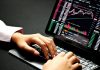 Can Nueva Wealth Make Trading Easier in 2025? person using black laptop computer