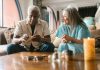 Senior Living Communities vs. Nursing Homes: What’s the Difference? Senior couple enjoying a calm afternoon indoors with relaxing activities.