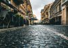 Living and Working in the EU with a Lithuanian Passport: A Gateway to New Opportunities gray and white concrete road between buildings during daytime