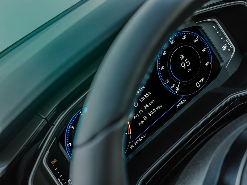 Photo by Aidan Hancock gray car steering wheel and instrument panel cluster