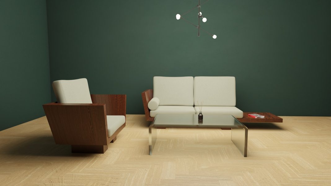 Photo by Filip Baotić a living room with a couch, chair and coffee table