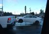 5 Myths About the Towing Industry That You Probably Believe a white car being towed by a tow truck