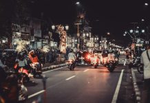How Burbank’s Stop-and-Go Traffic Increases Risk for Local Motorcyclists Lively night street with cars and motorbikes. Urban life and vibrant lights capture the essence of downtown energy.