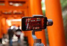 Lights, Camera, Results: 5 Ways to Make Client Videos That Actually Work person taking picture of temple