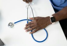 Navigating Professional Licensing Investigations: A Guide for Medical Practitioners a person holding a stethoscope