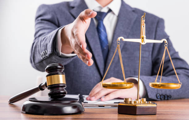 Man before the scales and judge hammer