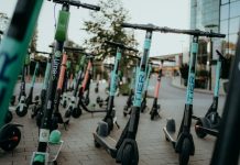E-Scooter Accidents in Atlanta: Are Riders Being Set Up to Fail? electric scooters parked on sidewalk