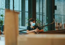 Understanding Your Legal Rights After a Workplace Illness man in black t-shirt sitting on chair