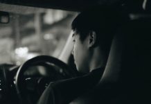 First Gear: 5 Must-Know Driving Tips for Your New Teen Driver grayscale photography of man driving car