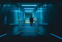 When It Comes To Your Finances – You Always Need Rainy Day Funds In Sydney A man is walking down a dark hallway