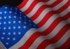 U.S. Citizenship Application Costs: What’s Included and What’s Extra Vibrant closeup of a waving American flag with stars and stripes.