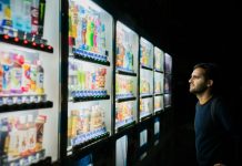What Exactly Is Smart Vending? man on front of vending machines at nighttime