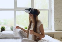 VR Porn and Relationships: Benefits, Concerns, and Misconceptions Young woman using virtual reality headset on bed