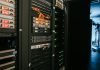 a rack of servers in a server room