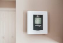 Top Heating Services Every Homeowner Should Schedule Before Winter white and gray thermostat at 19 5
