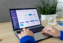 The Smart Consumer’s Guide to E-commerce, Credit Rewards, and Value Optimization a person typing on a laptop on a table