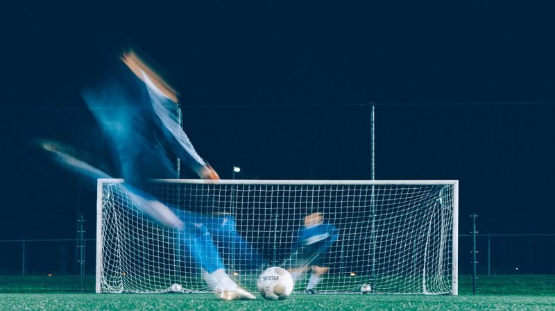 Photo by Jannes Glas timelapse photo of soccer player kicking ball