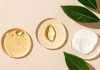 Clean Clinical Skincare: What It Actually Means (And Why It Matters) Skincare products with leaves on a light background.