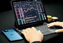 TSX Trade Emerges as a New All-Star for Canadian Investors in 2026 person using black and gray laptop computer