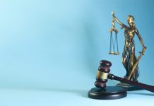 A Step-by-Step Look at What Happens After Legal Action Begins Lady justice and gavel on a blue background
