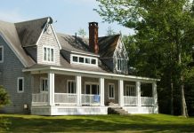 How to Actually Save Up for a House white and brown wooden house near green trees during daytime