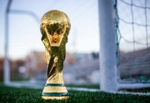 The World Cup Betting Markets That Get Interesting Before Kickoff a golden soccer trophy sitting on top of a field