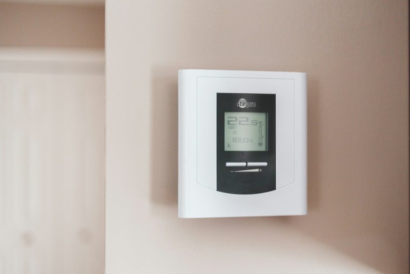 Photo by Erik Mclean white and gray thermostat at 19 5