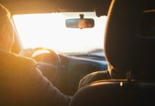 7 Driving Tips to Avoid a Car Accident man driving car during golden hour