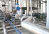 Cutting the Waste: How Reclaiming Extrusion Scrap is Changing Plastic Profile Production grey industrial equipment