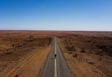Essential Upgrades to Protect Your 4×4 During Outback Adventures gray concrete road between brown field under blue sky during daytime