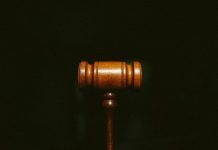 8 Signs You Might Have a Personal Injury Case brown wooden stand with black background