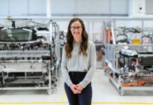Why Manufacturing Consulting Is the Missing Step Between a Great Product and a Profitable Business woman in white long sleeve shirt and black pants wearing black framed eyeglasses