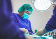 How to Choose a Surgeon for Your Upcoming Procedure woman wears green face mask