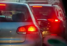 Why You Should Fight Every Traffic Offense a group of cars driving down a street next to each other