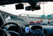 Why Distracted Driving Is Dangerous and How It Causes Serious Crashes man driving vehicle with GPS system turned on