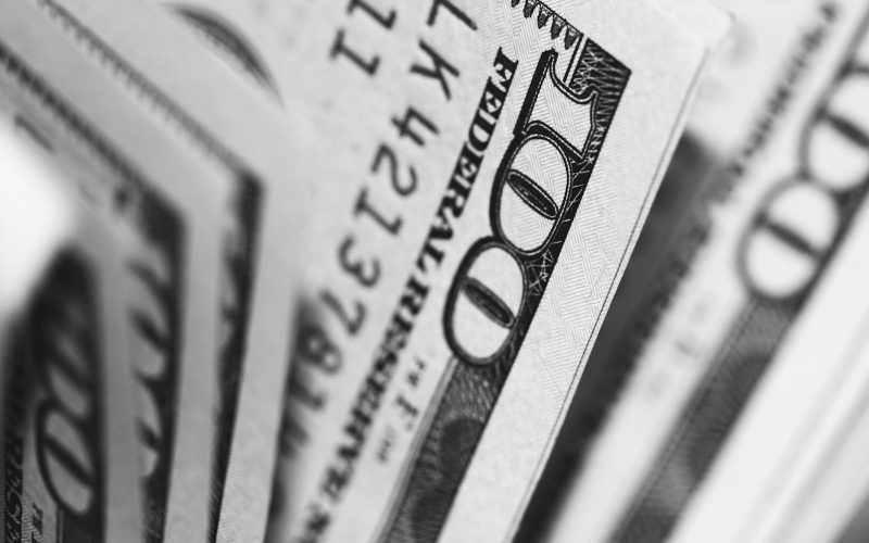 Photo by Pepi Stojanovski closeup photo of 100 US dollar banknotes