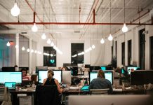 Why Accessibility Should Be a Priority When Selecting Office Space people sitting on chair in front of computer