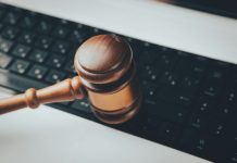 Five Decisions That Shape a Pennsylvania Personal Injury Claim a wooden gaven sitting on top of a computer keyboard