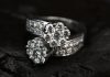 How the Custom Craftsmanship Business Model Thrives in a Mass Market Economy silver diamond studded ring on black surface