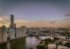How to Plan an Unforgettable Luxury Weekend in Brisbane a bridge over a river with a city in the background