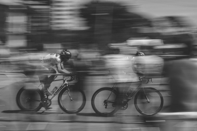 Photo by Maico Amorim two persons riding on bicycles