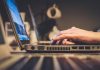 How Digital Entertainment Changed Online Gambling person using silver laptop computer on desk